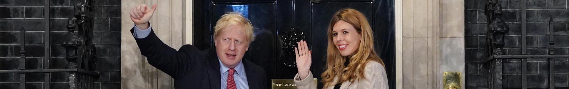 Prime Minister Boris Johnson and his partner Carrie Symonds enter Downing Street as the Conservatives celebrate a sweeping election victory on December 13, 2019 in London, England