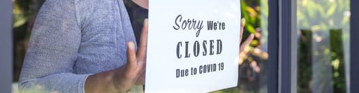Shop sign saying closed due to COVID 19