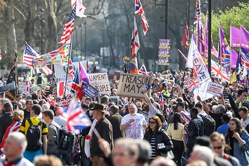 Supporters of Brexit rally near the Houses of Parliament in London, U.K., on Friday, March 29, 2019. U.K. Prime Minister Theresa May is making a desperate push to get her Brexit deal approved in Parliament to avoid a huge delay to Britain's divorce from the EU, even though she's facing what seem to be impossible odds. Photographer: Chris Ratcliffe/Bloomberg via Getty Images