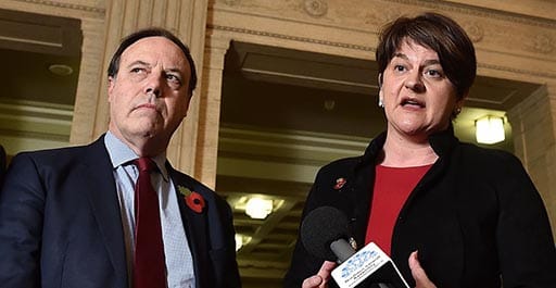 DUP leader Arlene Foster and deputy leader Nigel Dodds address the media at Stormont following talks with the UK Brexit secretary Dominic Raab on November 2, 2018 in Belfast, Northern Ireland