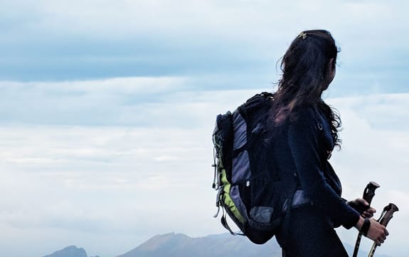 Female hiker looks into the distance