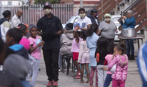 Children queue for food