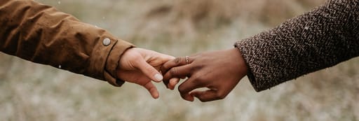 Couple holding hands