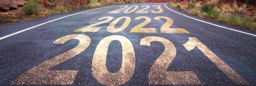 Road with 2021, 2022 and 2023 years printed on it