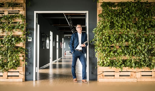 business man in sustainable office
