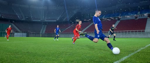 Football match played infront of any empty stadium