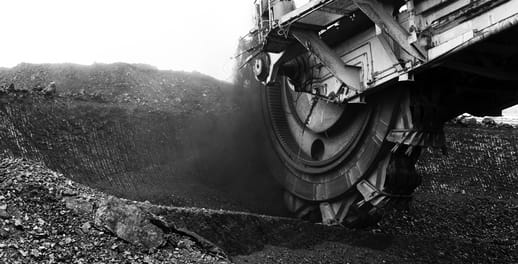 A bucket-wheel excavator at an open-pit mine extracting materials