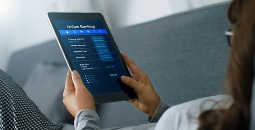 Female doing online banking on tablet