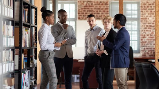 Colleagues collaborating in an office