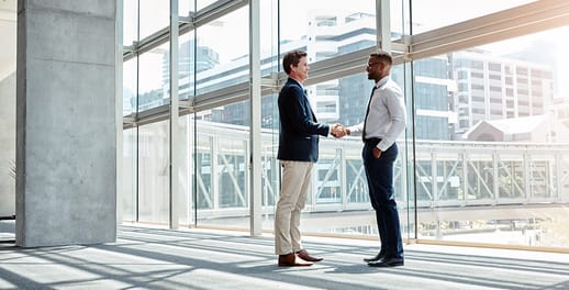 two businessmen shaking hands