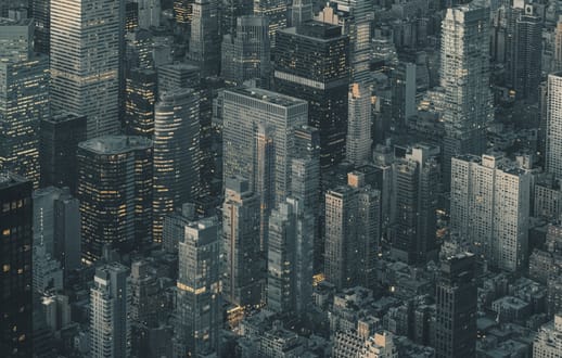 Looking down on city tower blocks