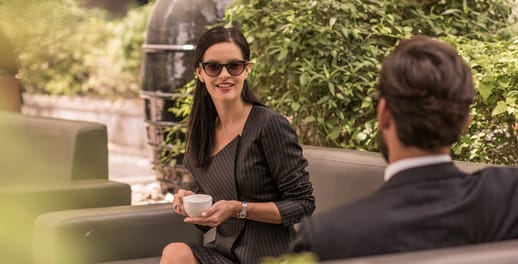 Couple chatting in garden