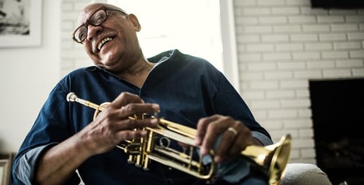 smiling old man and his trumpet