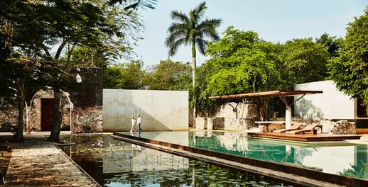View across pool and fish pond of exotic location