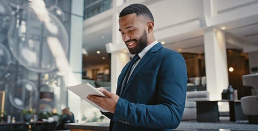 Business man checking tablet