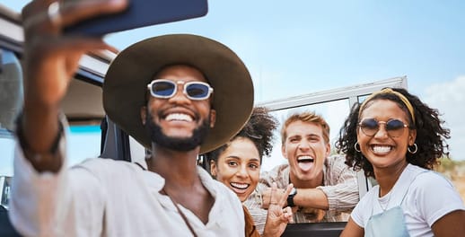 group of young professionals taking selfie