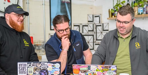 Adfluential directors working on there laptops