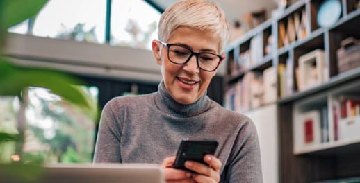 A lady looking at her phone