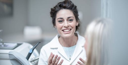 Dentist with a client