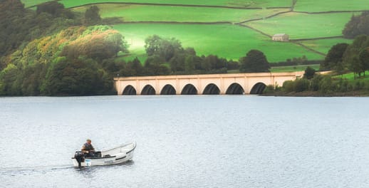 Boatman out on the water in the countryside