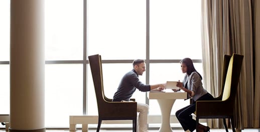 Couple talking over a table