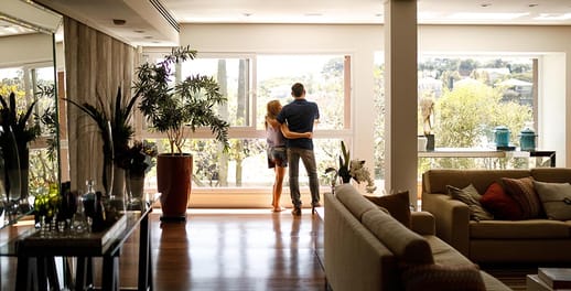 Couple looking out a window