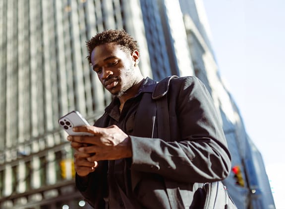 business man holding mobile phone