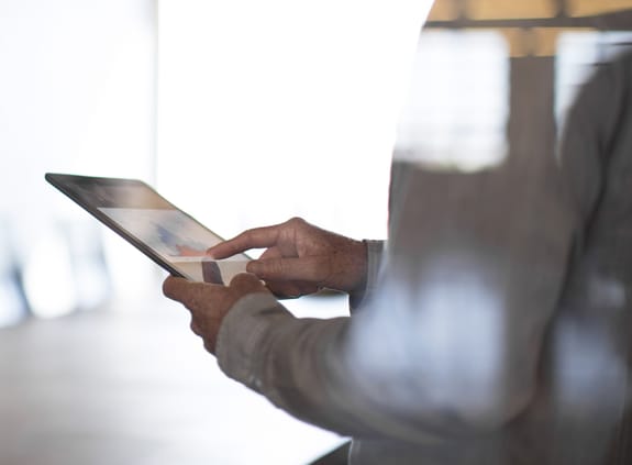 Man holding tablet