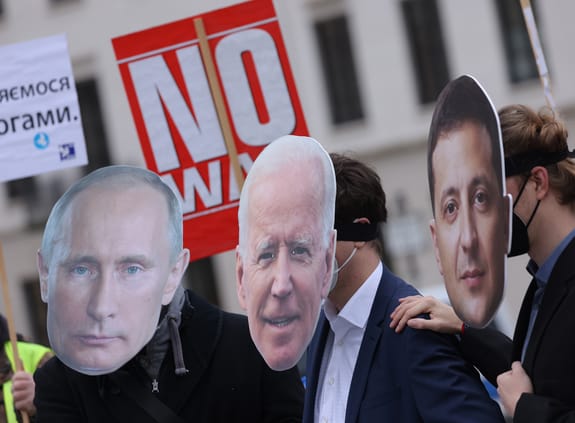 Putin Biden Zelenskyy makes at No War protest