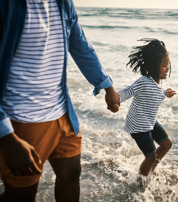 father-and-child-playing-in-the-sea