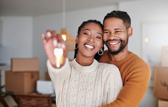 Young professional couple in their first home