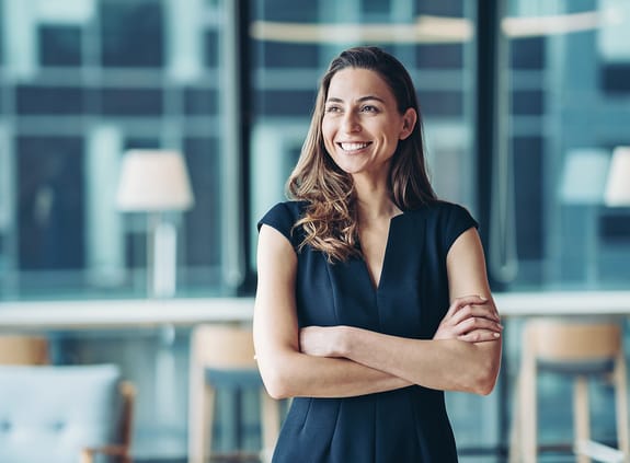 Portrait of a businesswoman standing in a a modern office