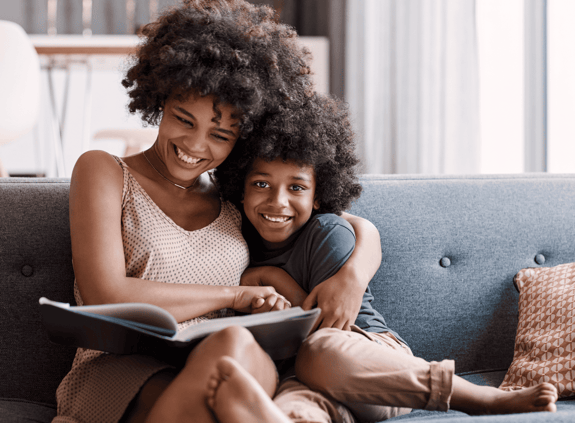 Mom and daughter reading a book