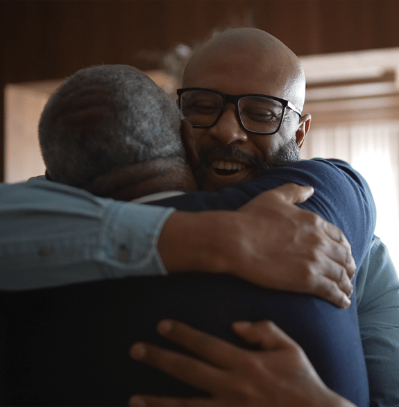 Father and son hugging