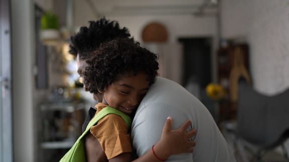 Father and son hugging