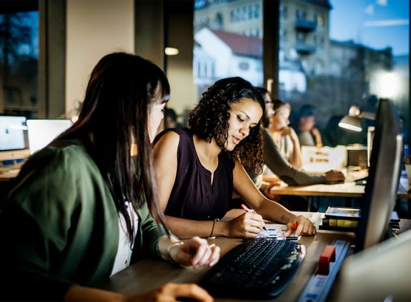 young creative professionals working at their desk