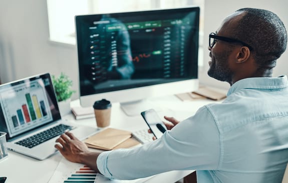 Young businessman working at his desk on computer