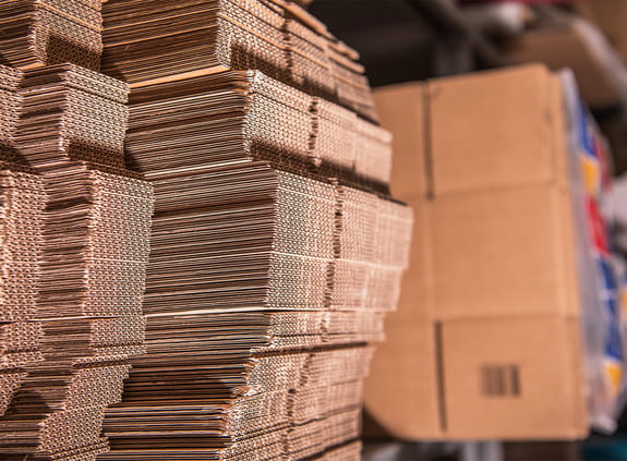 Stack of flattened cardboard boxes