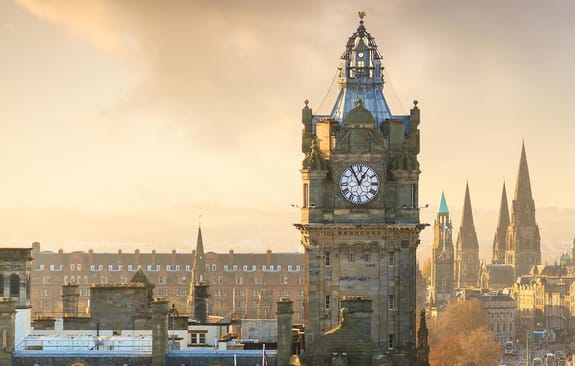 A clock face on the side of a tower