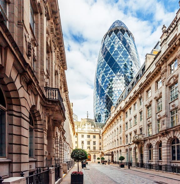 London street with the Gherkin in the background
