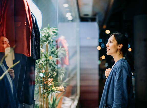 Woman looking in a shop window