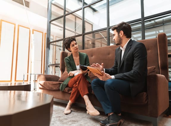 financial adviser speaking client