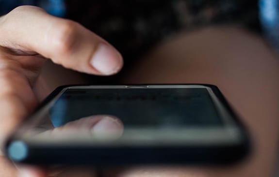 Woman's hands and smartphone