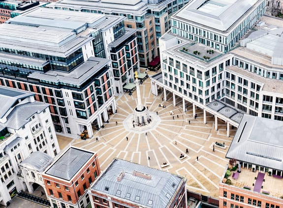 close up of buildings with open square in centre