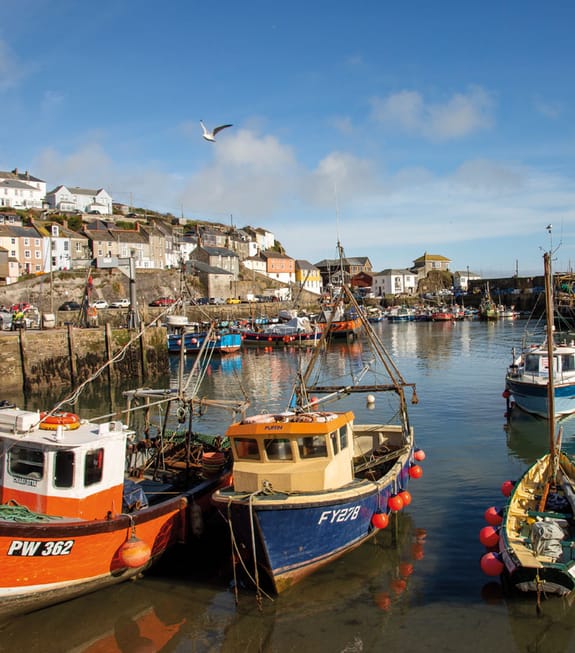 Boats docked in an English seaside bay