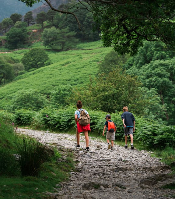 Family hiking through the countryside