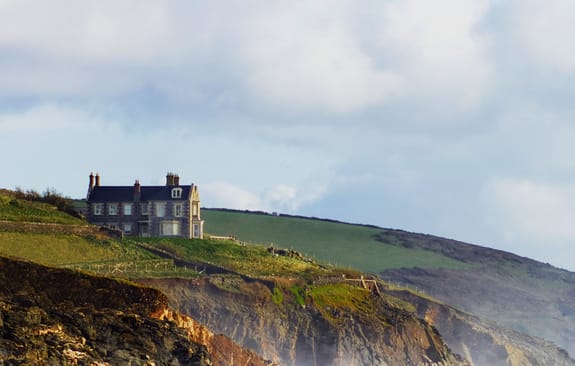 Large estate atop an English countryside cliff
