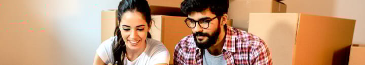 Young couple deciding on housing plans