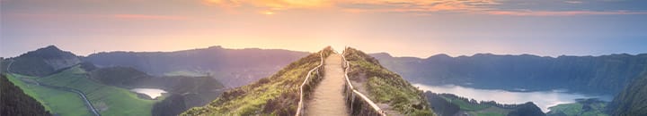 Walkway at the top of a mountain overlooking lake