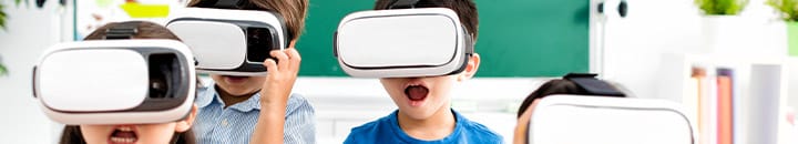 Children wearing VR sets